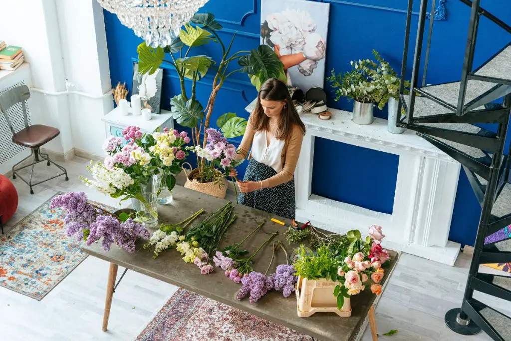 local florist preparing funeral flowers