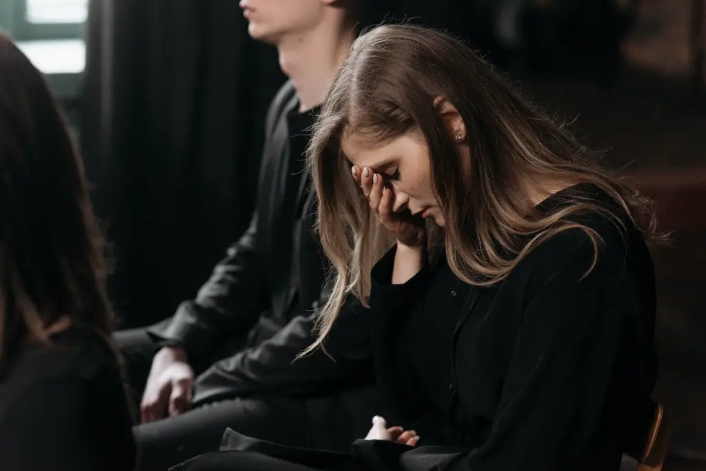 grieving woman at funeral