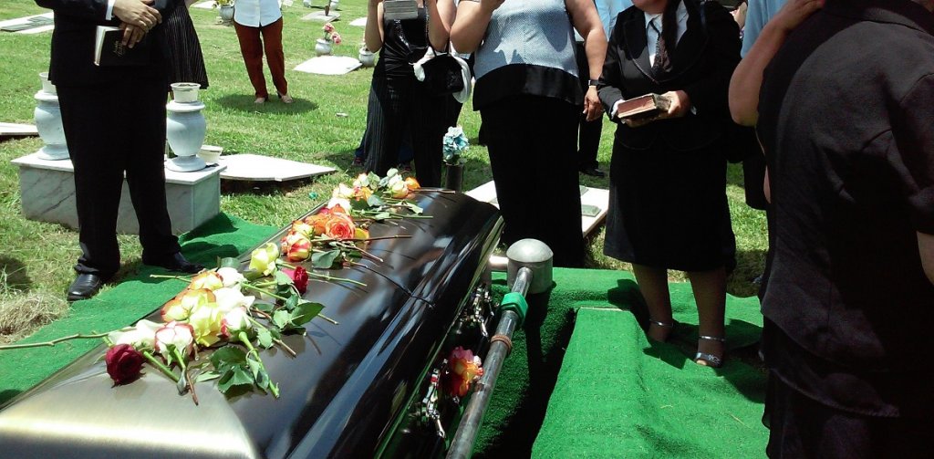 funeral casket at gravesite