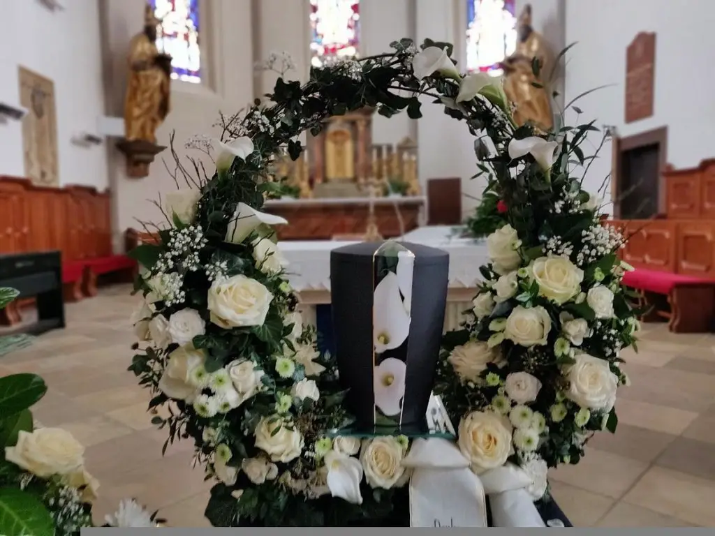 funeral wreath on easel