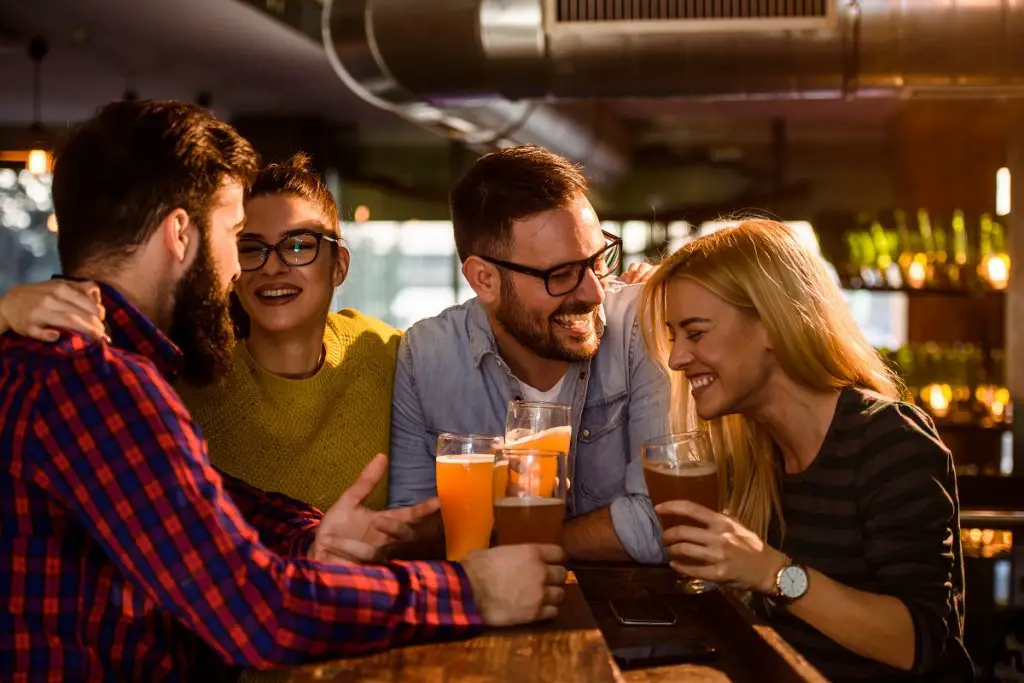 Friends remembering loved one at a bar