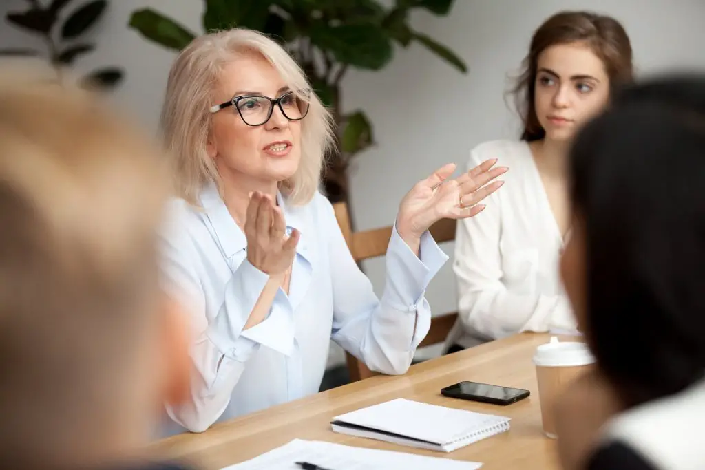 Older woman working with youth