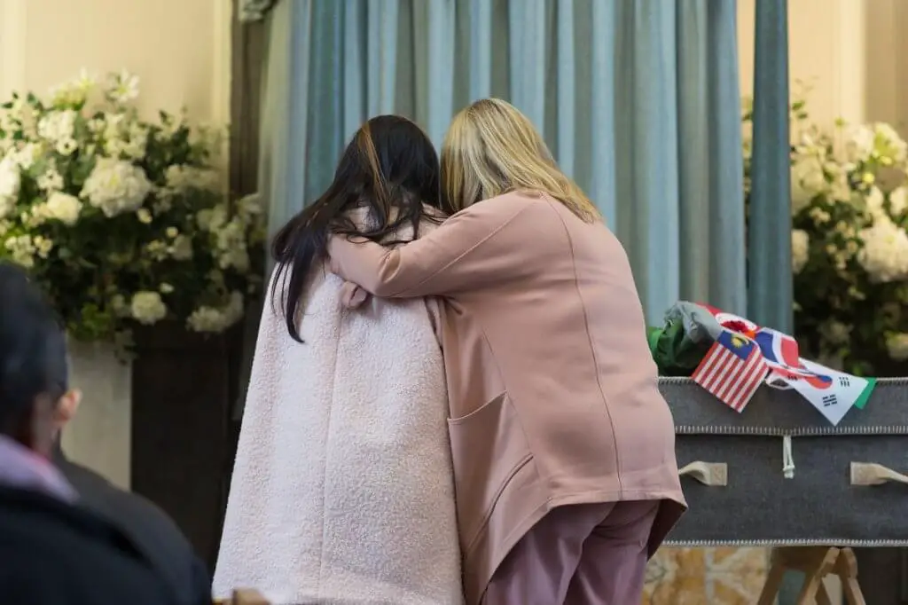 Visiting the casket at the wake